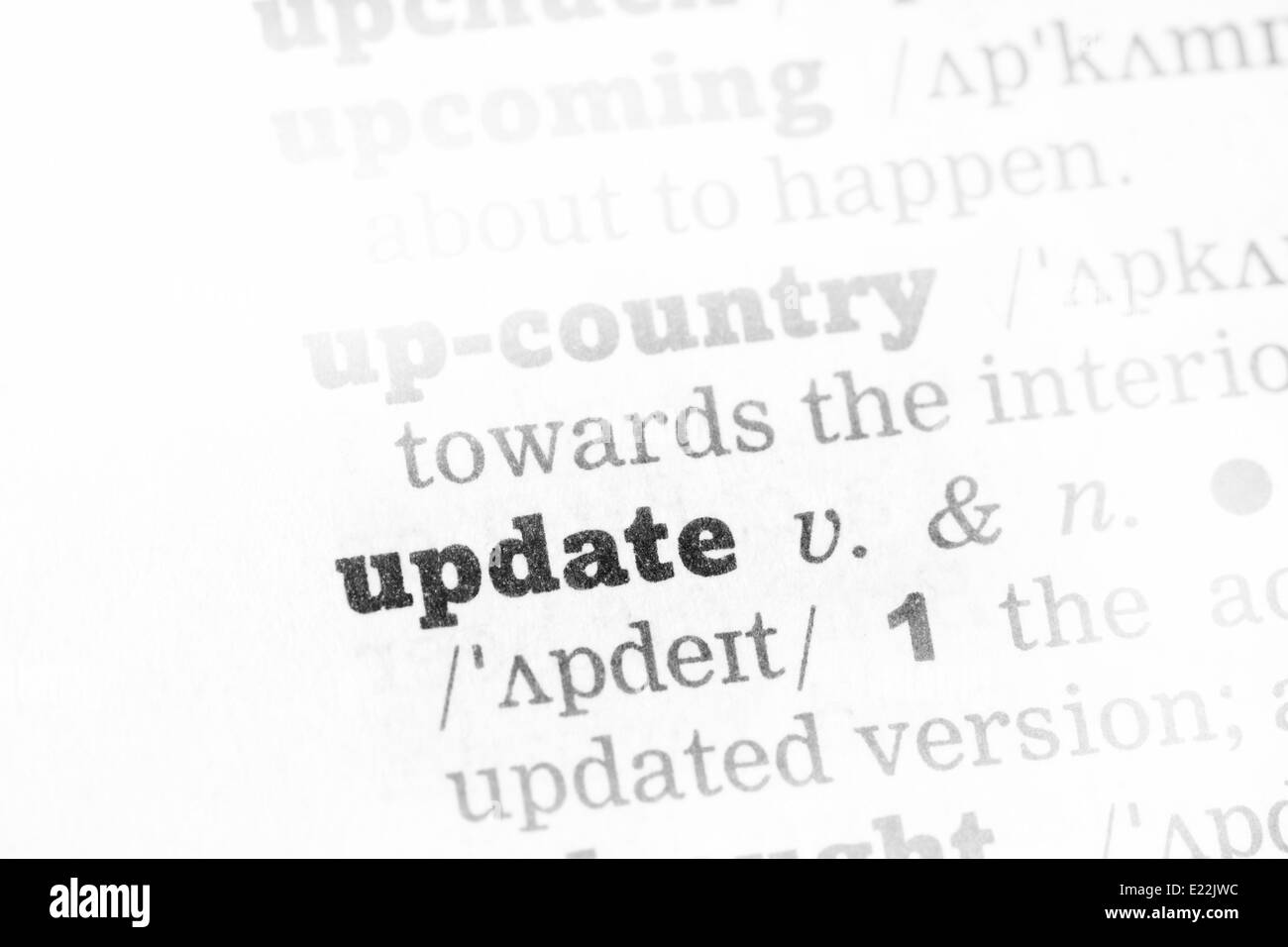 Update Dictionary Definition single word with soft focus Stock Photo