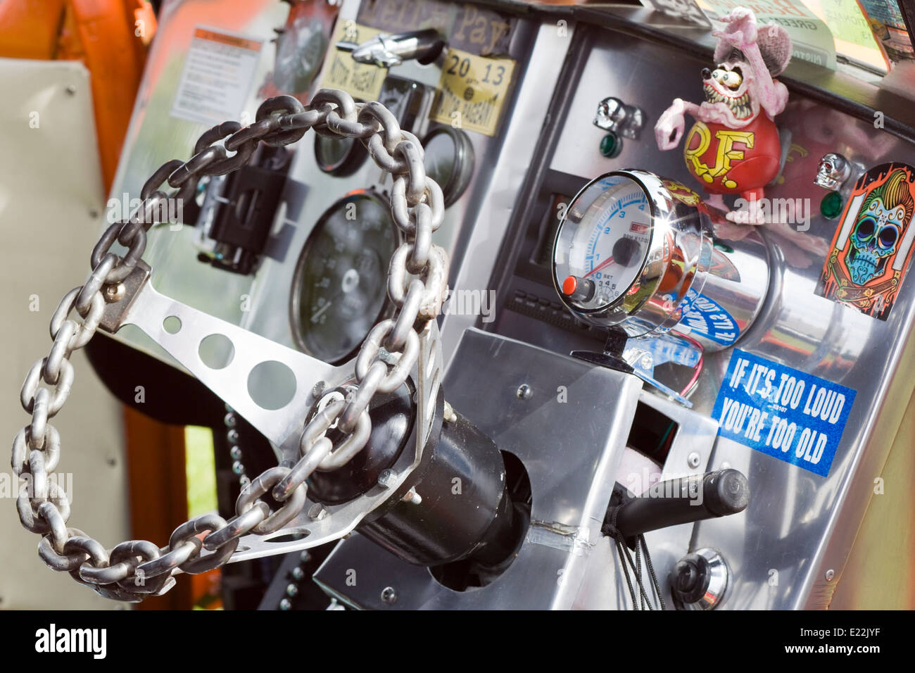 Chain link steering wheel of a low rider car hires stock photography