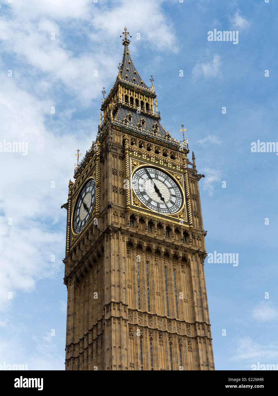 Upper section of Big Ben at the Palace of Westminster London England with the dial showing 4.55pm Stock Photo