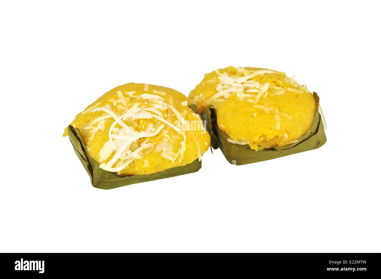 Steamed toddy palm cake in banana leaf isolated on white background. Stock Photo