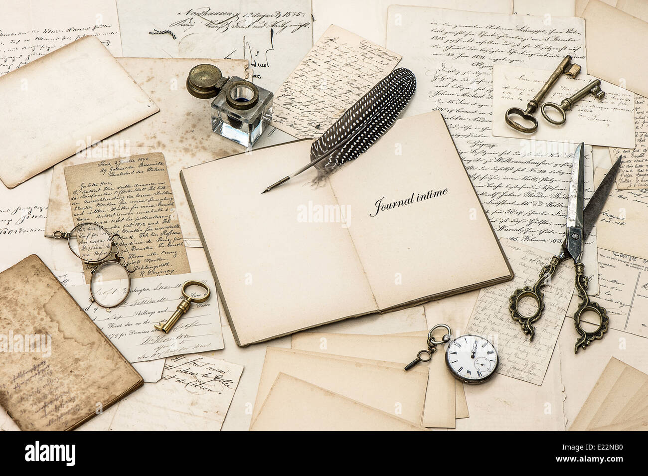 open diary notebook, old letters and postcards. nostalgic sentimental paper background Stock Photo