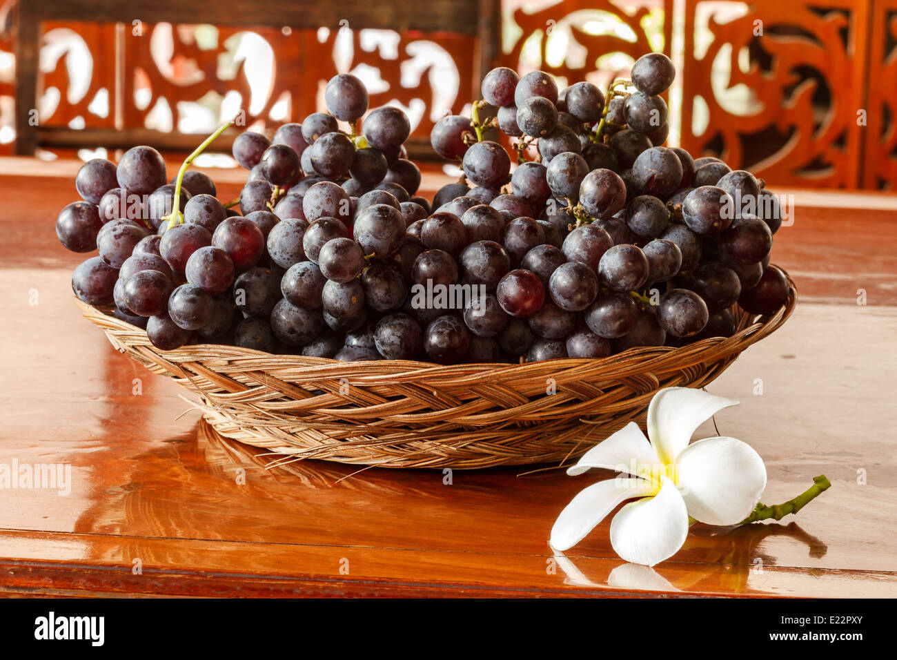 Fresh grapes in a basket Stock Photo