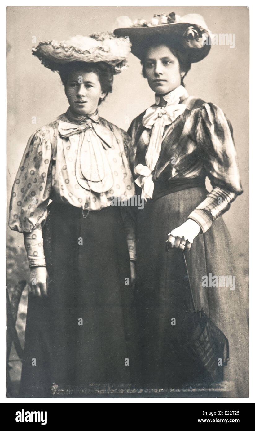 GERMANY, BERLIN - CIRCA 1900: two young ladies wearing vintage clothing. original antique photo Stock Photo