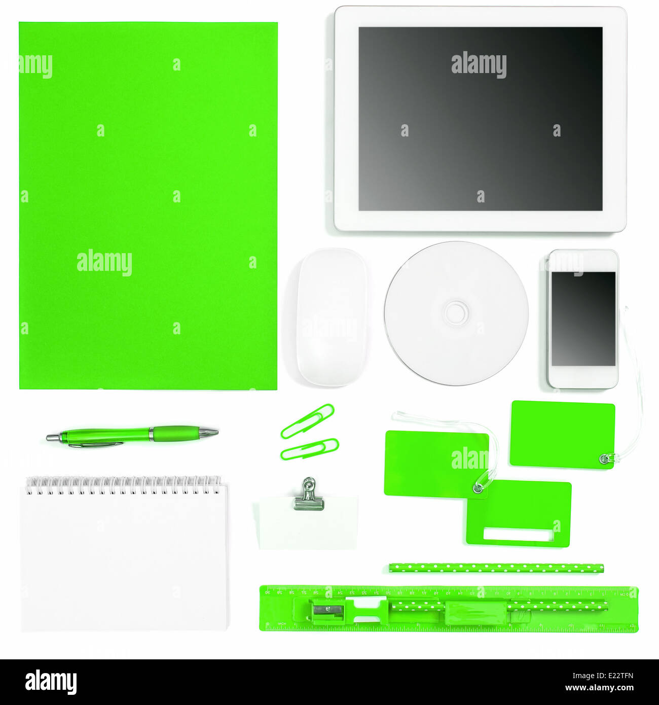 Set of green colored office tools over white background. Corporate identity objects Stock Photo