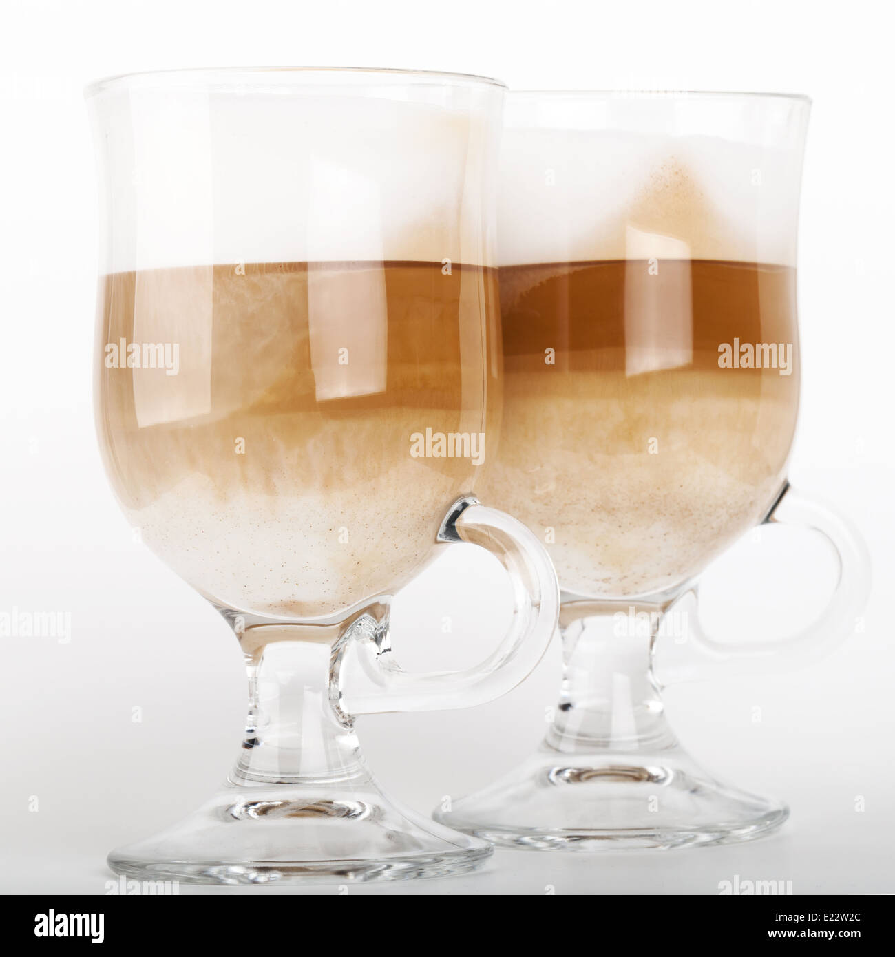 Two big glass mugs with handles of latte coffee, macro photo Stock Photo Alamy