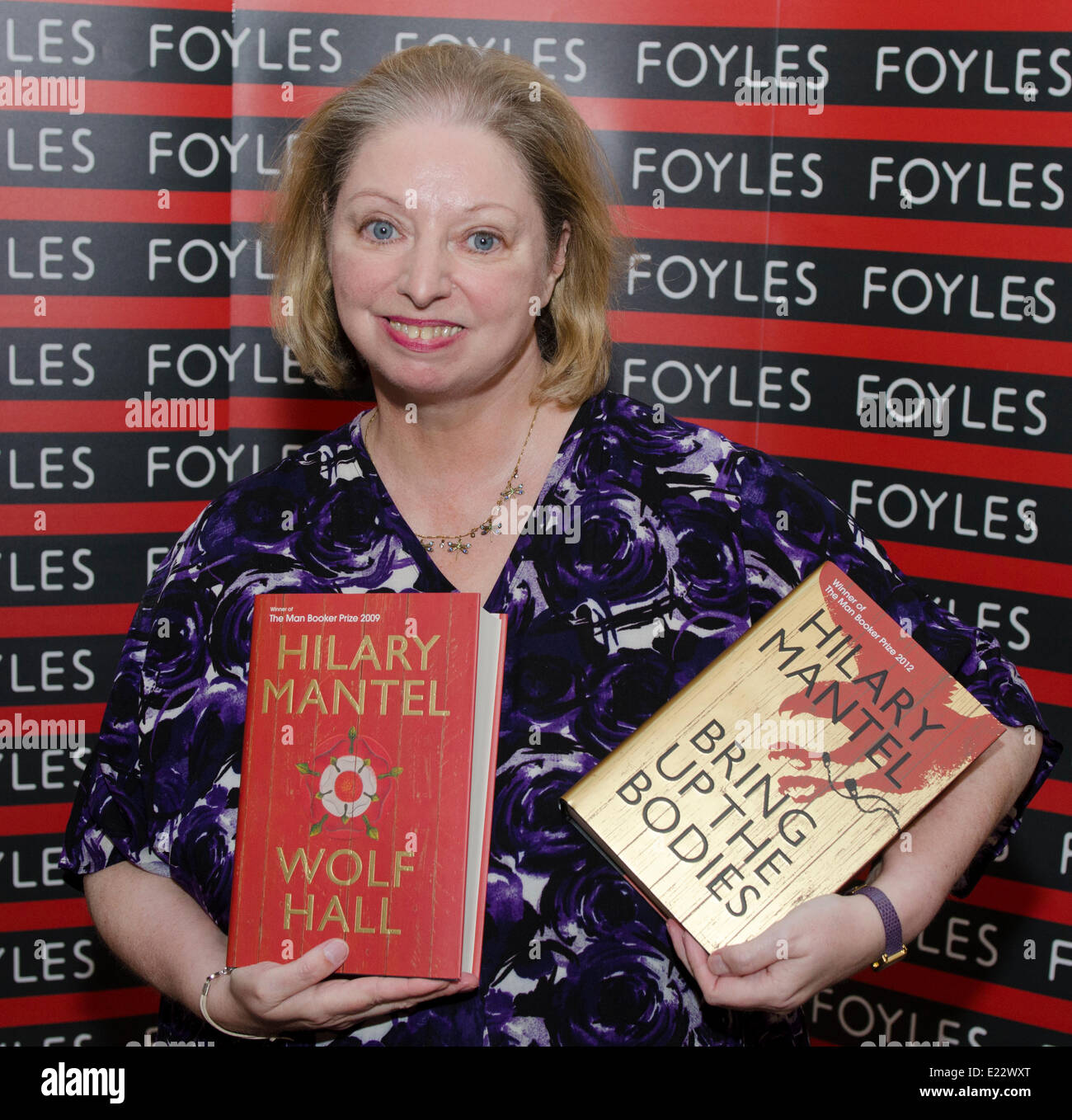 London, UK. 13th June 2014 Dame Hilary Mantel, double Man Booker prize winner holding Wolf Hall and Bring up The bodies at opening of the new Foyles bookshop in London Credit:  Prixnews/Alamy Live News Stock Photo