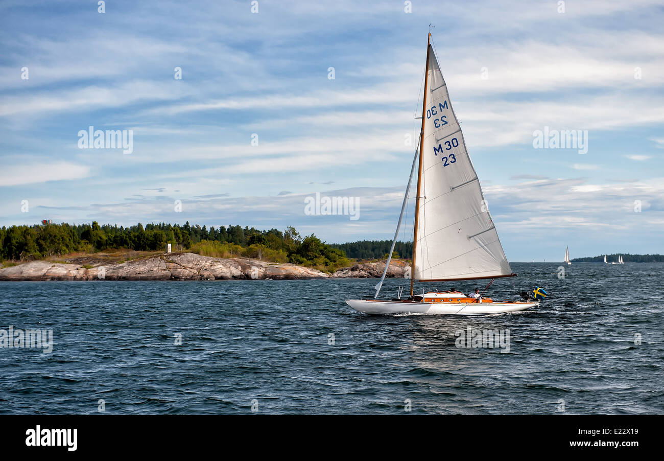 Summer in Sweden - classic M30 sailing boat cruises through the archipelago  of Gryt Stock Photo - Alamy