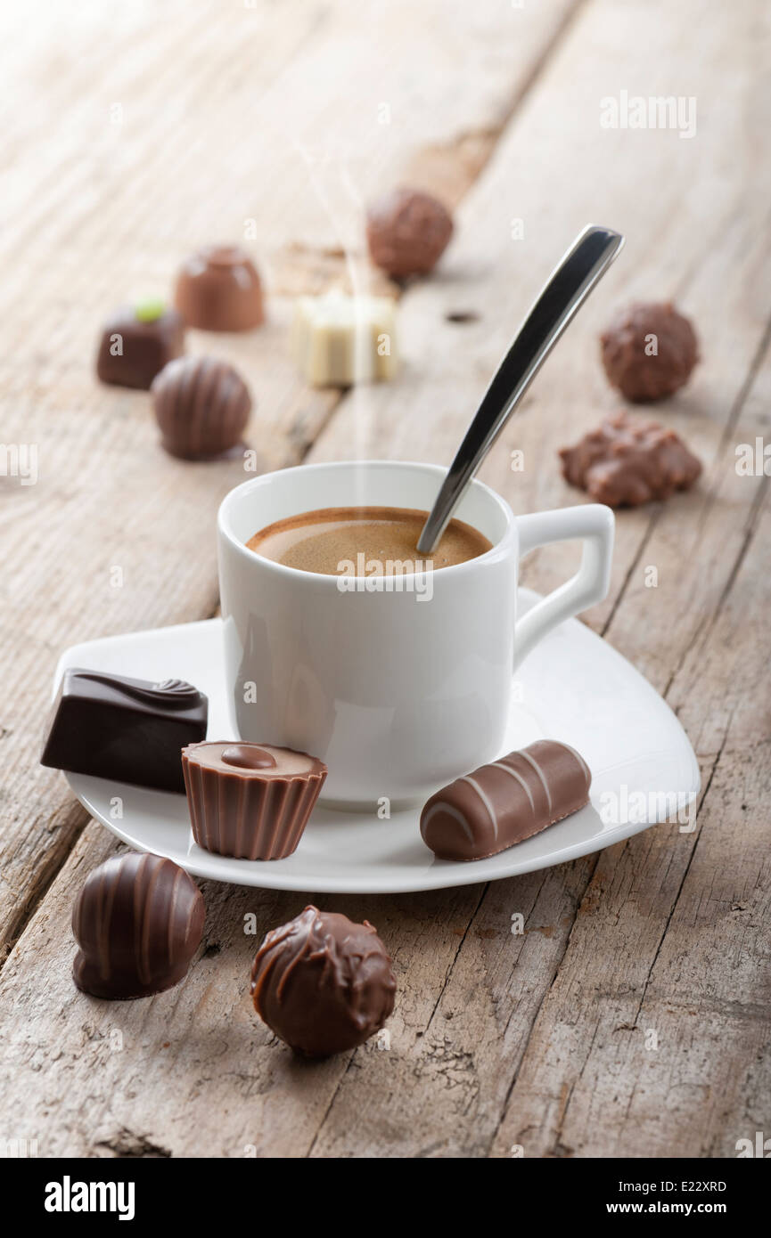 assorted chocolates confectionery with cup of coffee Stock Photo Alamy