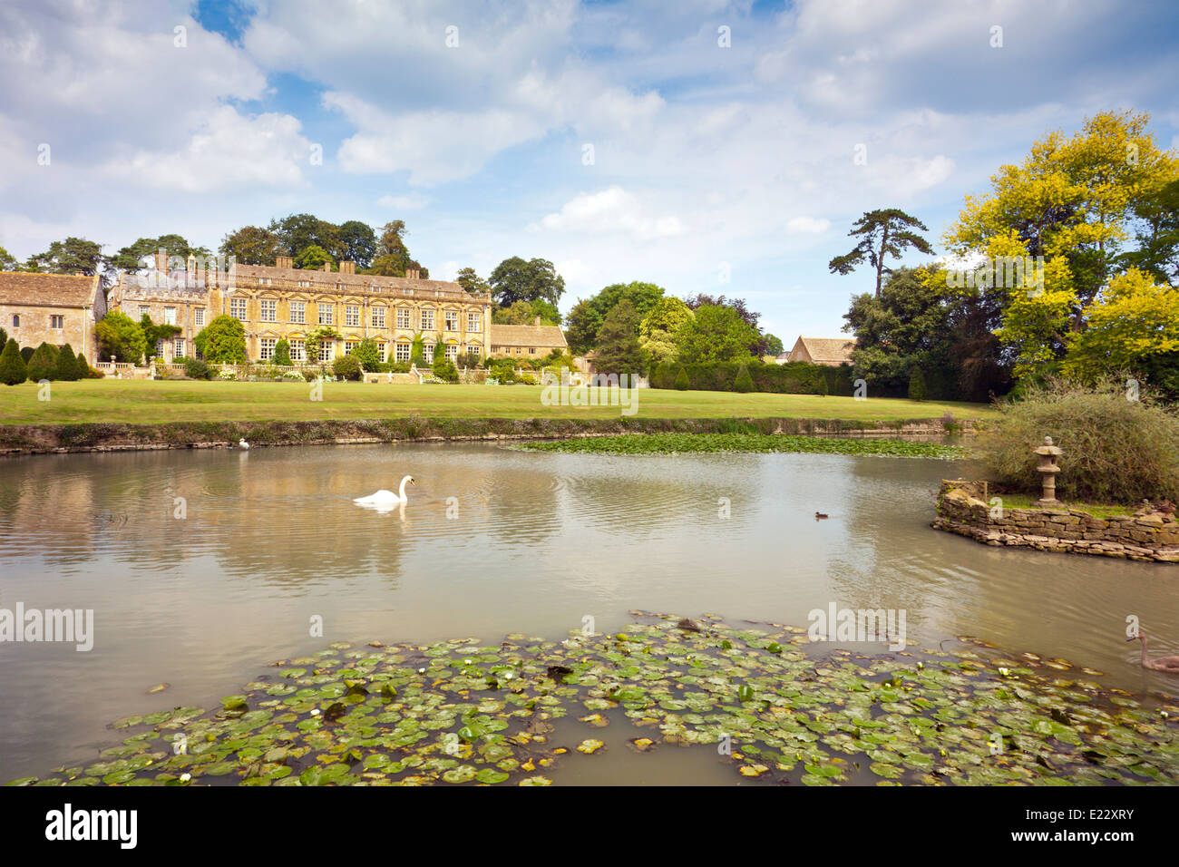 The south front and lake at Brympton d'Evercy House nr Yeovil, Somerset, England, UK Stock Photo