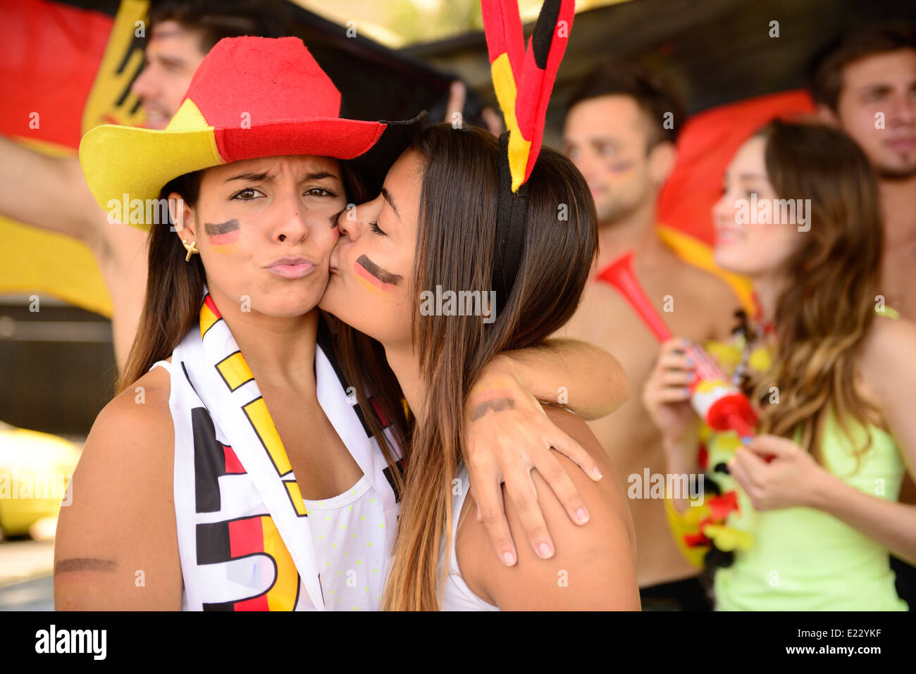 German couple of soccer sport fans kissing celebrating Stock Photo Alamy