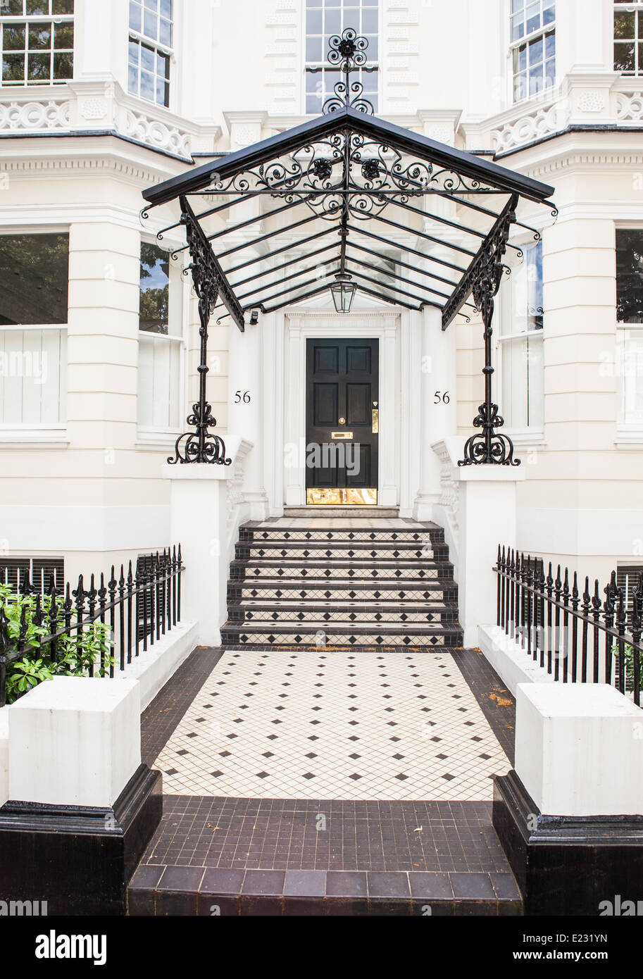 A grand entrance to large stucco-fronted house in Holland Park, West London Stock Photo
