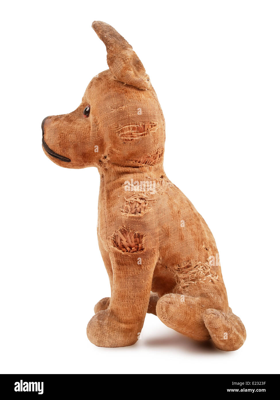 vintage toy dog, stuffed with straw, side view, isolated on white background Stock Photo