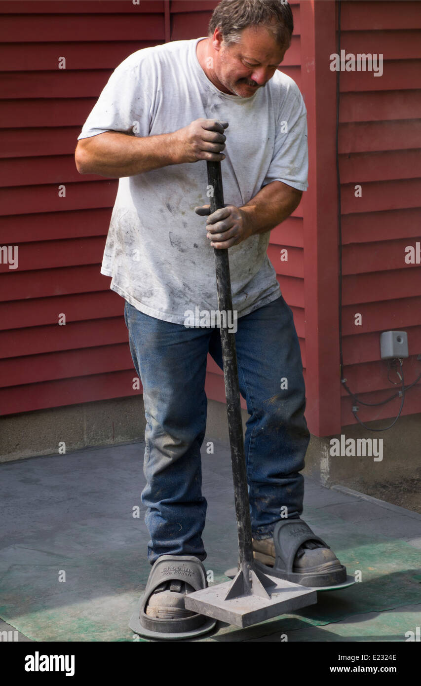 Pounding rubber patterns on concrete hires stock photography and