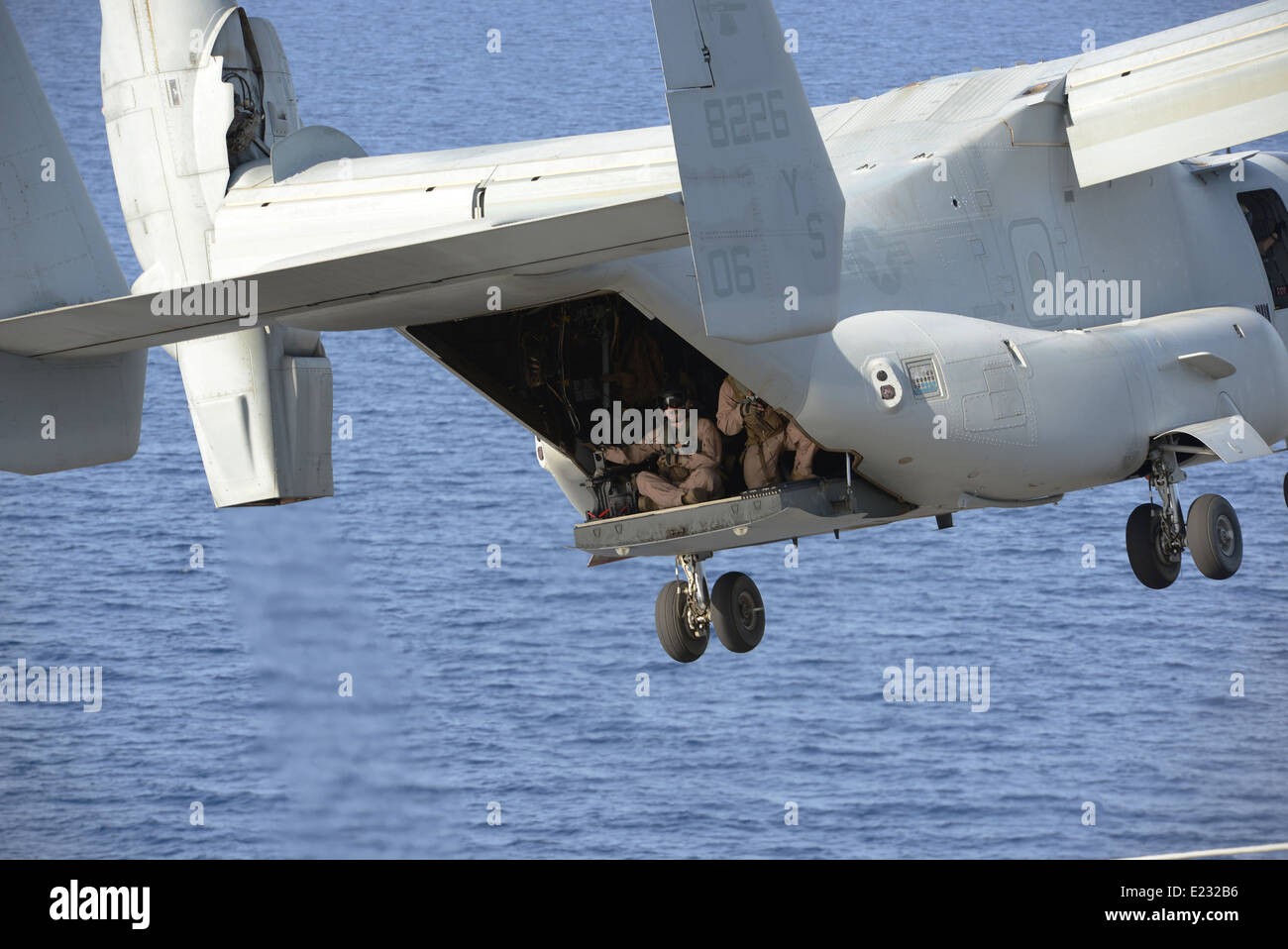 A US Marine Corps MV-22 Osprey tiltrotor aircraft takes off from the ...