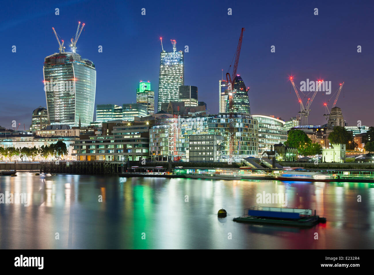 Night view over the Thames River in London to the city with several new skyscrapers Stock Photo