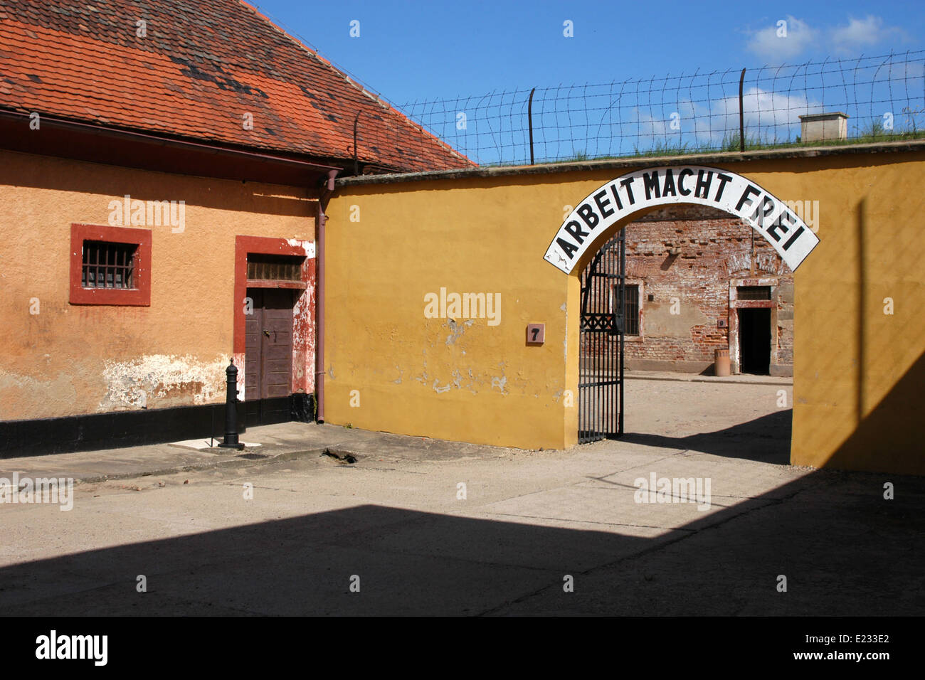 Archway with the Nazi motto 'Arbeit macht frei' in the Gestapo prison, now the Terezin Memorial in Terezin, Czech Republic. Stock Photo