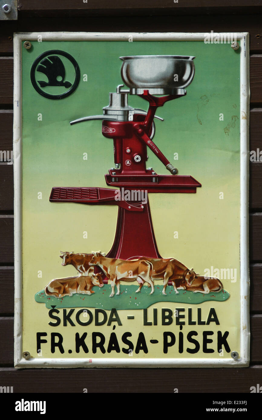 Vintage advertisement for the Skoda manual milk separators in an antique shop in Cesky Krumlov in South Bohemia, Czech Republic. Stock Photo