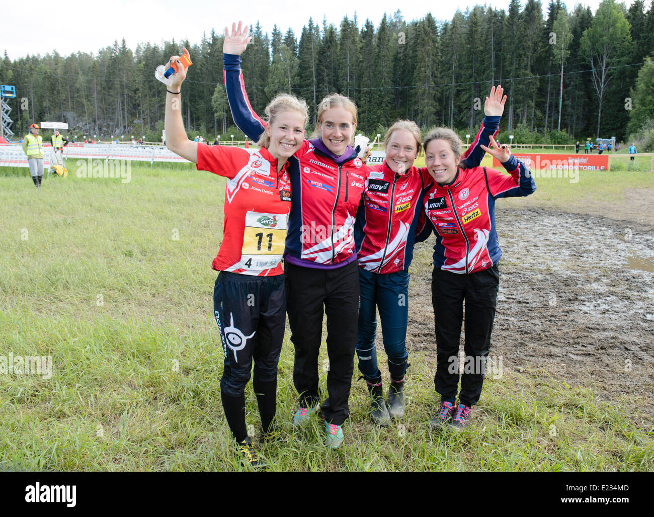 Kuopio, Finland. 14th June 2014. 2rd team Tampereen pyrintö at finish of  ladies “Venla” relay at Saturday 14 June 2014. Kuopio, Finland Credit:  Markku Heikkilä/Alamy Live News Stock Photo - Alamy