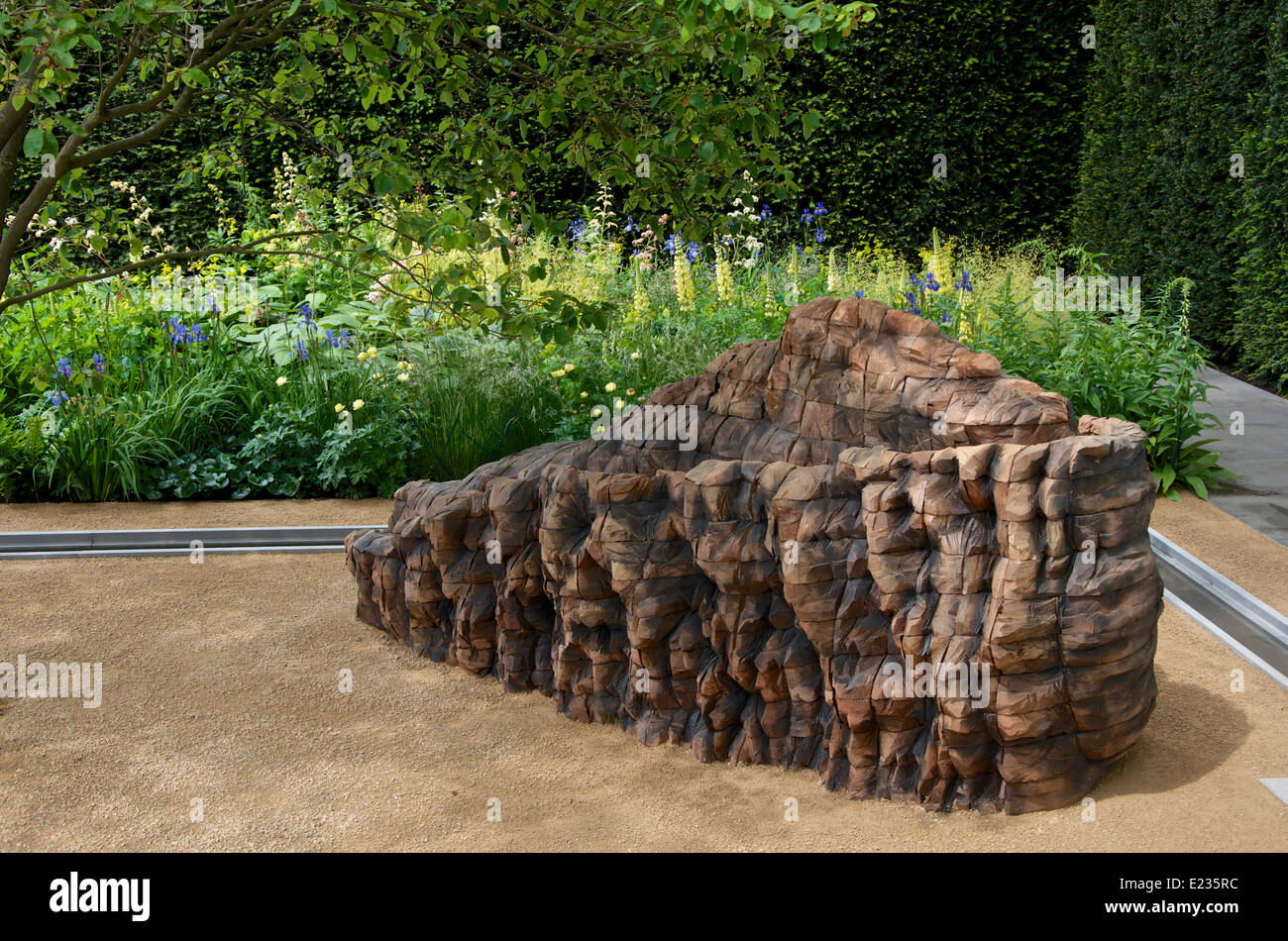 Cedar beam by artist Ursula von Rydingsvard in The Laurent-Perrier Garden at RHS Chelsea Flower Show 2014. Stock Photo