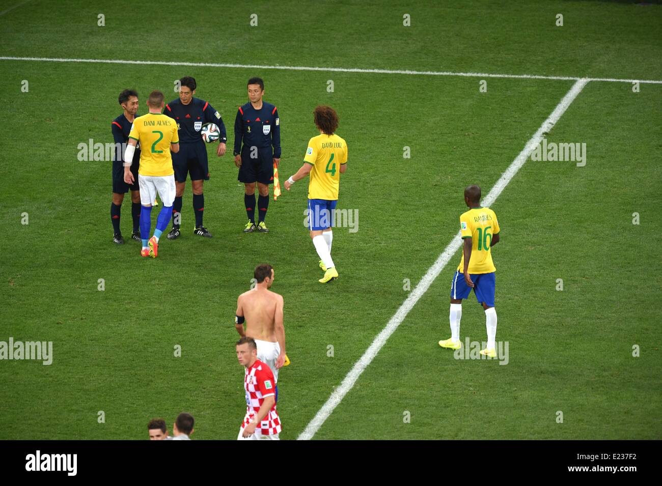 Sao Paulo, Brazil. 12th June, 2014. (L-R) Toshiyuki Nagi, Yuichi Nishimura, Toru Sagara (Referee) Football/Soccer : Daniel Alves of Brazil shakes hands with referees after the FIFA World Cup Brazil 2014 Group A match between Brazil 3-1 Croatia at Arena de Sao Paulo in Sao Paulo, Brazil . © FAR EAST PRESS/AFLO/Alamy Live News Stock Photo