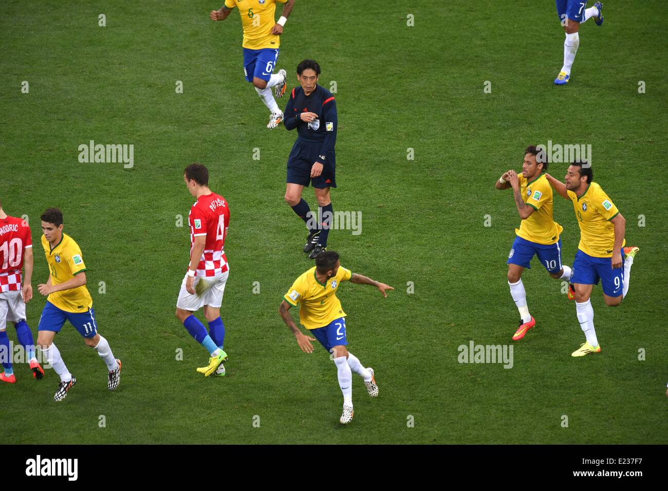 Sao Paulo, Brazil. 12th June, 2014. (R-L) Fred, Neymar (BRA), Yuichi Nishimura (Referee) Football/Soccer : Neymar of Brazil celebrates with his teammate Fred after scoring their first goal during the FIFA World Cup Brazil 2014 Group A match between Brazil 3-1 Croatia at Arena de Sao Paulo in Sao Paulo, Brazil . © FAR EAST PRESS/AFLO/Alamy Live News Stock Photo