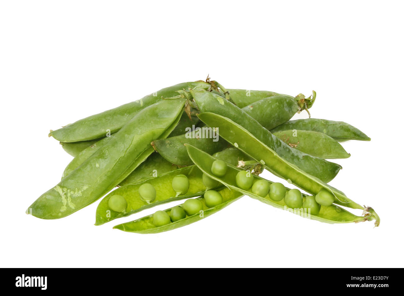 Whole pea pods and shelled peas isolated against white Stock Photo