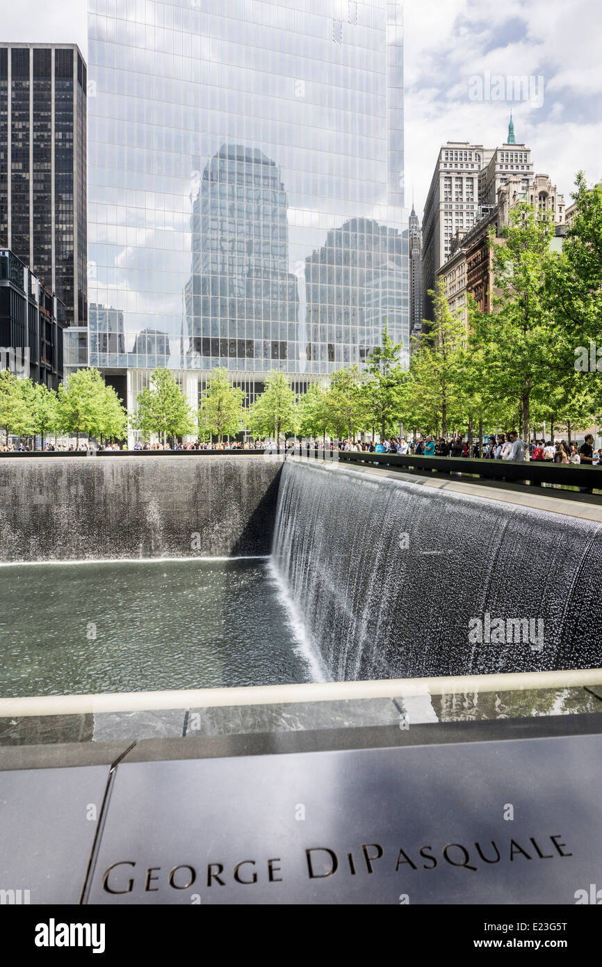 looking north across north pool World Trade Center memorial plaza which reflects footprint of destroyed north tower Ground Zero Stock Photo
