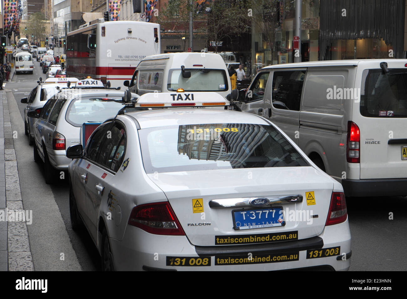 Sydney taxi cars wait in a taxi rank for customers, ttraffic in Sydney city centre,new south wales,Australia Stock Photo