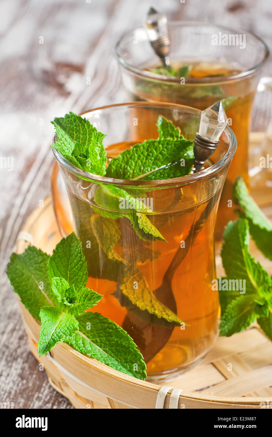 Traditional turkish tea with fresh mint. Selective focus Stock Photo