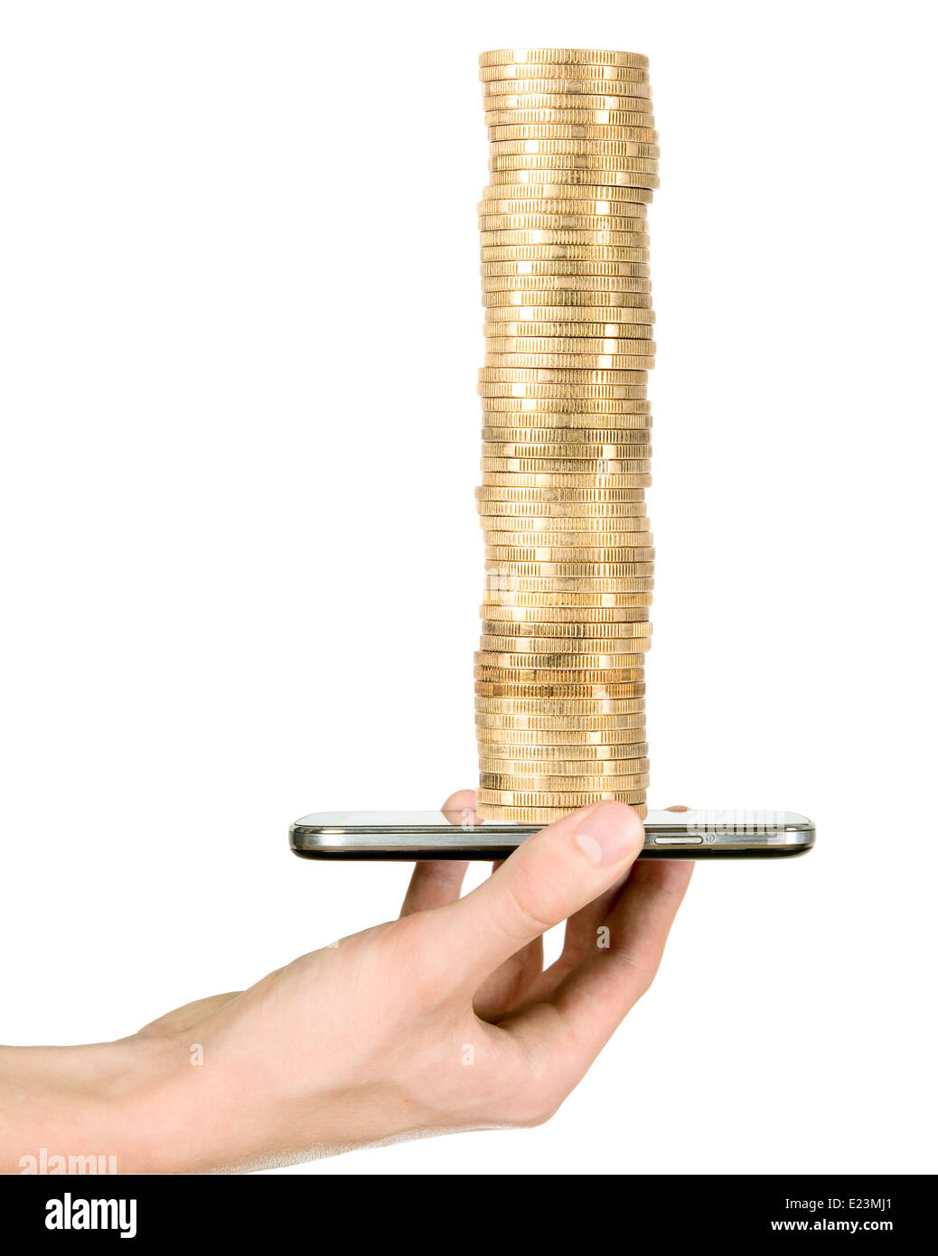 Man is holding mobile phone and showing tower of coins Stock Photo