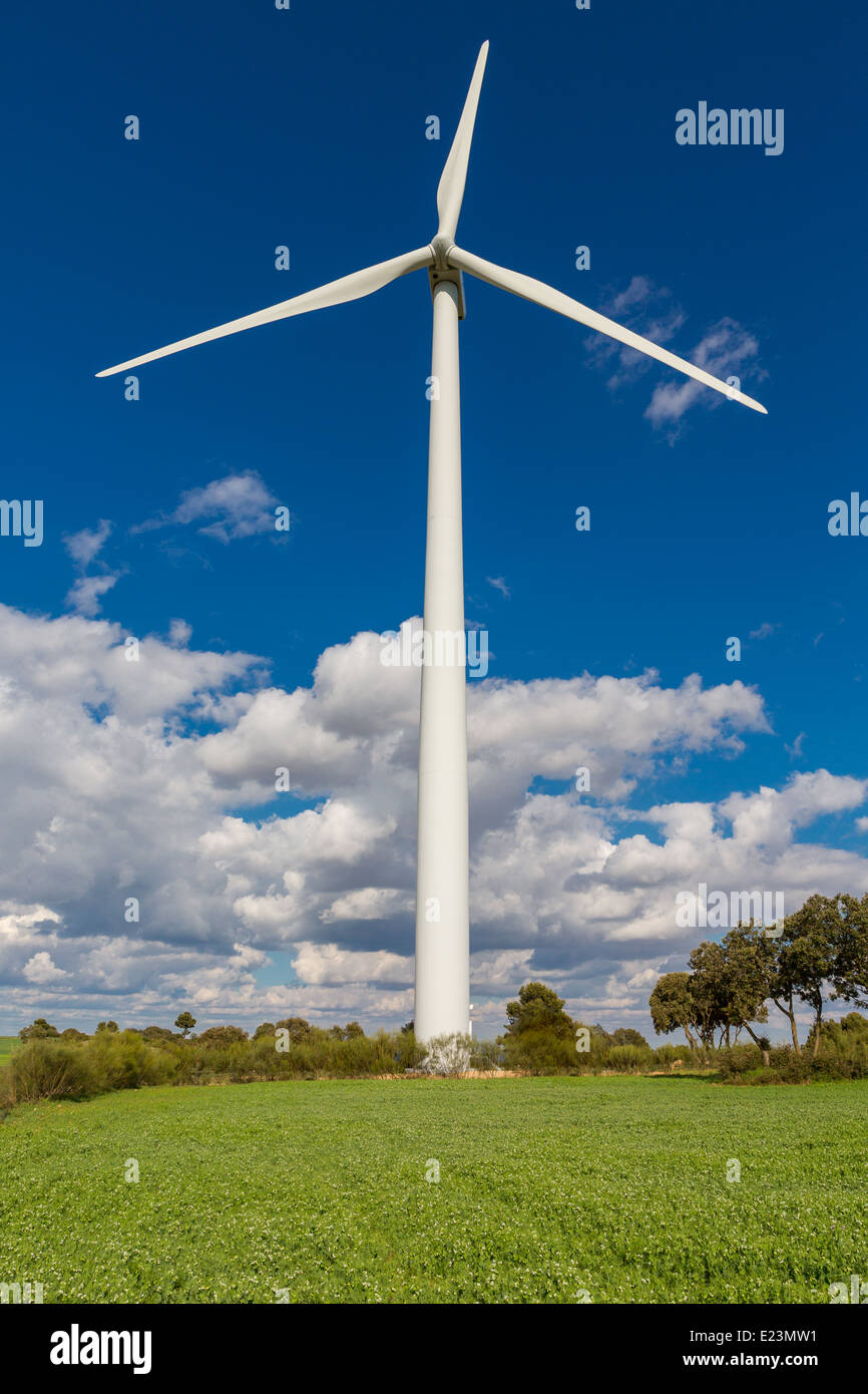 Wind turbine against blue sky Stock Photo - Alamy