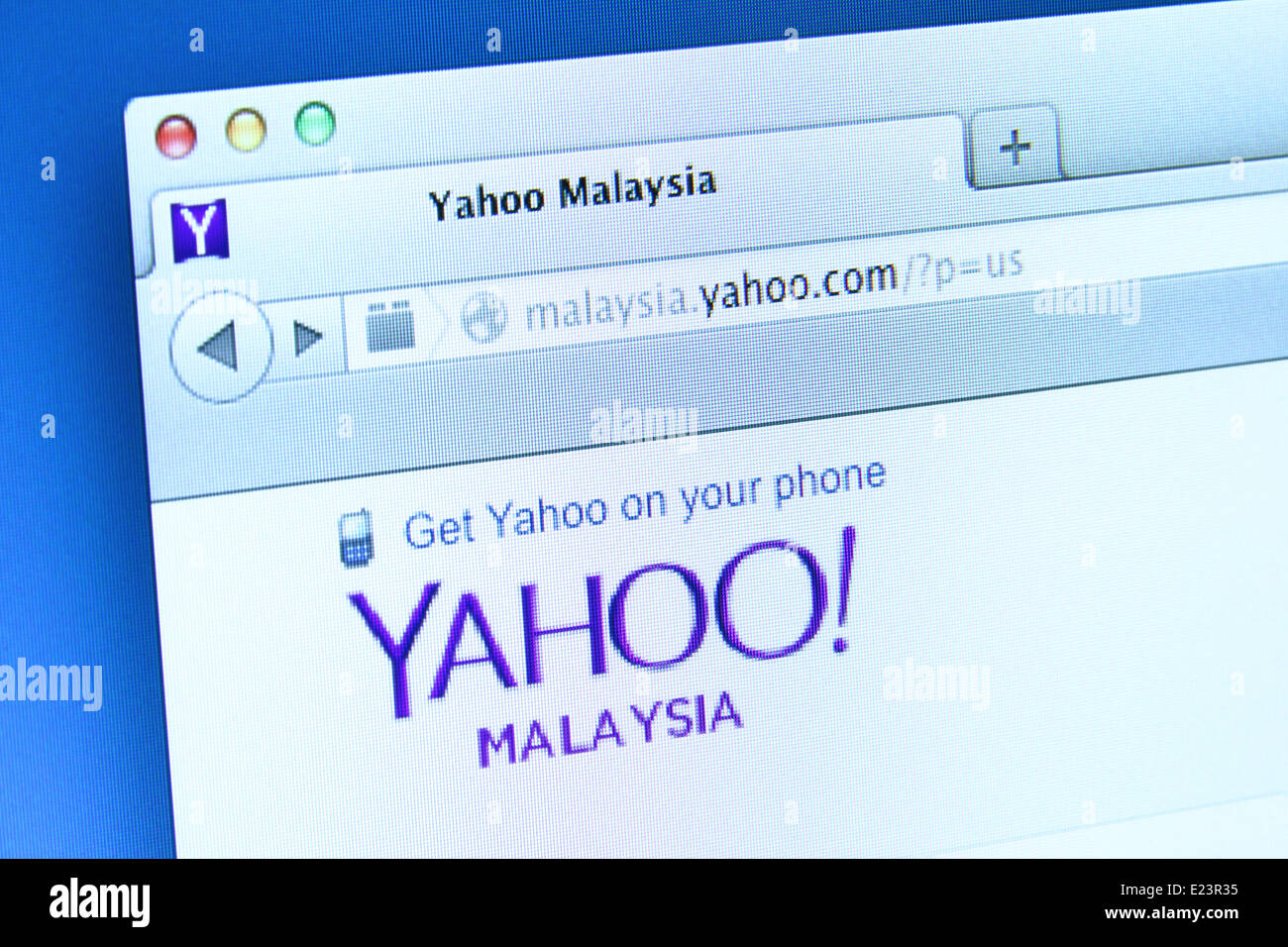 Photo of Yahoo webpage on a monitor screen. Yahoo! is an Internet portal that incorporates a search engine Stock Photo