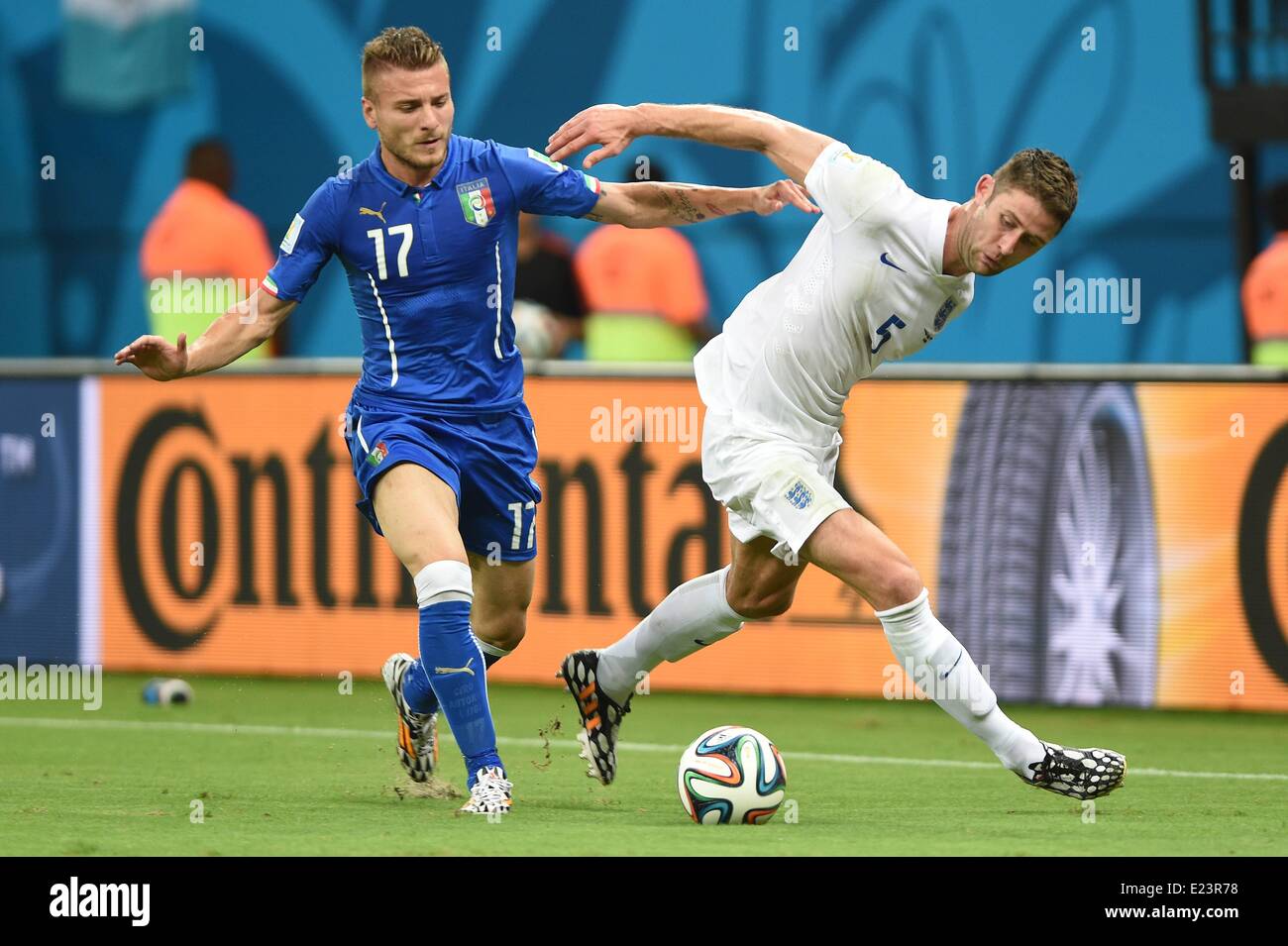 Manaus, Brazil. 14th June, 2014. Ciro IMMOBILE (ITA) challenges Gary CAHILL (ENG)during the match between England and Italy, at the 2014 World Cup, held at the Arena Amazon. Credit:  Action Plus Sports/Alamy Live News Stock Photo