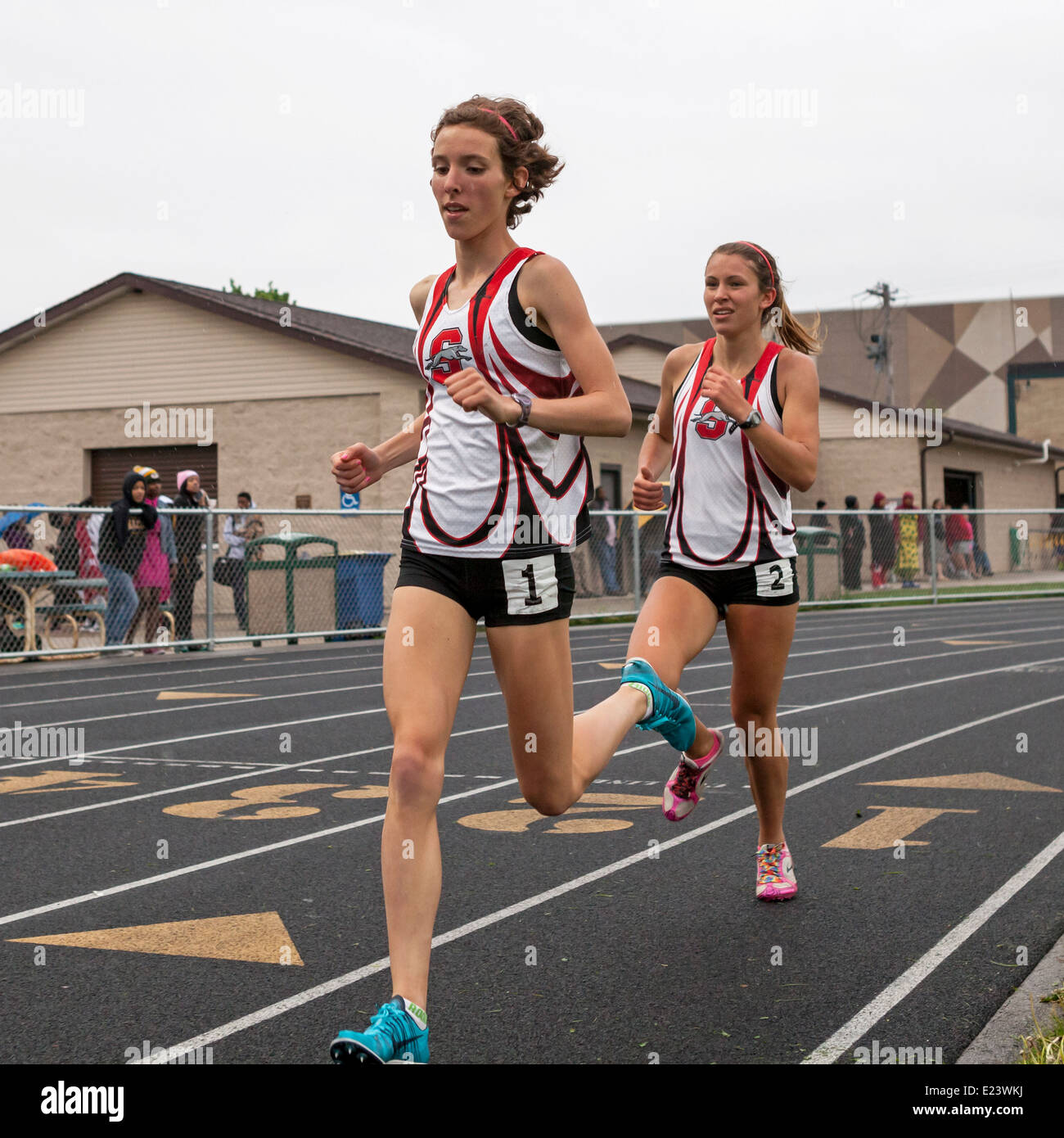 High school athletes compete in a track and filed meet in Milwaukee, Wisconsin, USA. Stock Photo