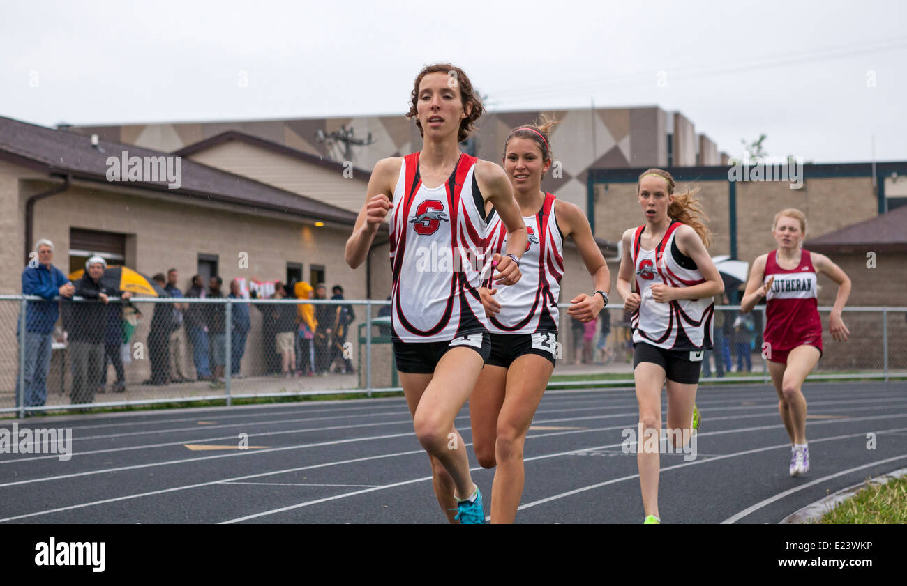 High school athletes compete in a track and filed meet in Milwaukee, Wisconsin, USA. Stock Photo