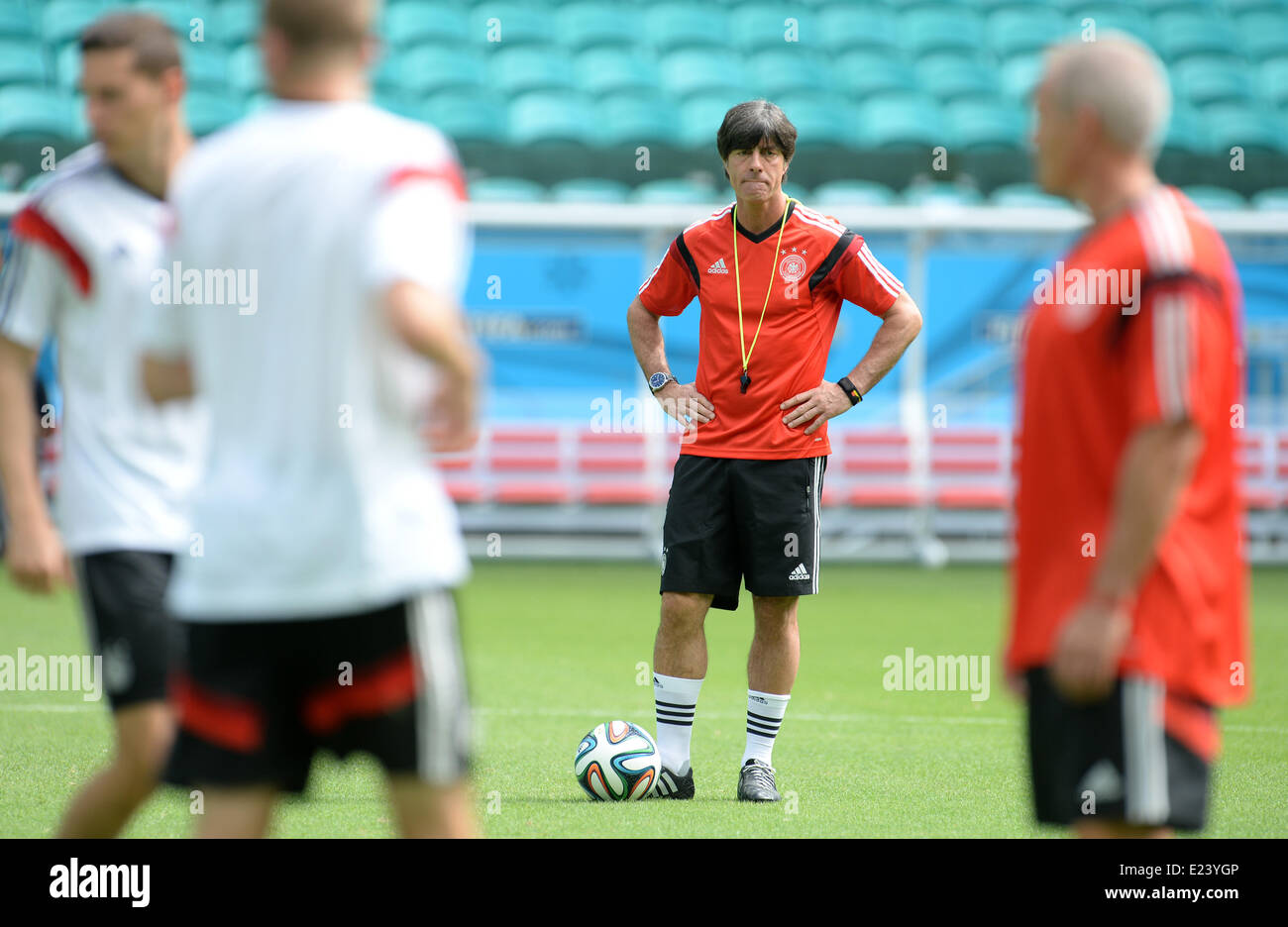 Salvador da Bahia, Brazil. 15th June, 2014. Head coach Joachim Loew (C) seen during a training session of the German national soccer team at the Arena Fonte Nova Stadium in Salvador da Bahia, Brazil, 15 June 2014. Germany will face Portugal in their group G preliminary round match at the FIFA World Cup 2014 on 16 June 2014 in Salvador da Bahia. Photo: Andreas Gebert/dpa (RESTRICTIONS APPLY: Editorial Use Only, not used in association with any commercial entity - Images must not be used in any form of alert service or push service of any kind including via mobile alert services, downloads to mo Stock Photo