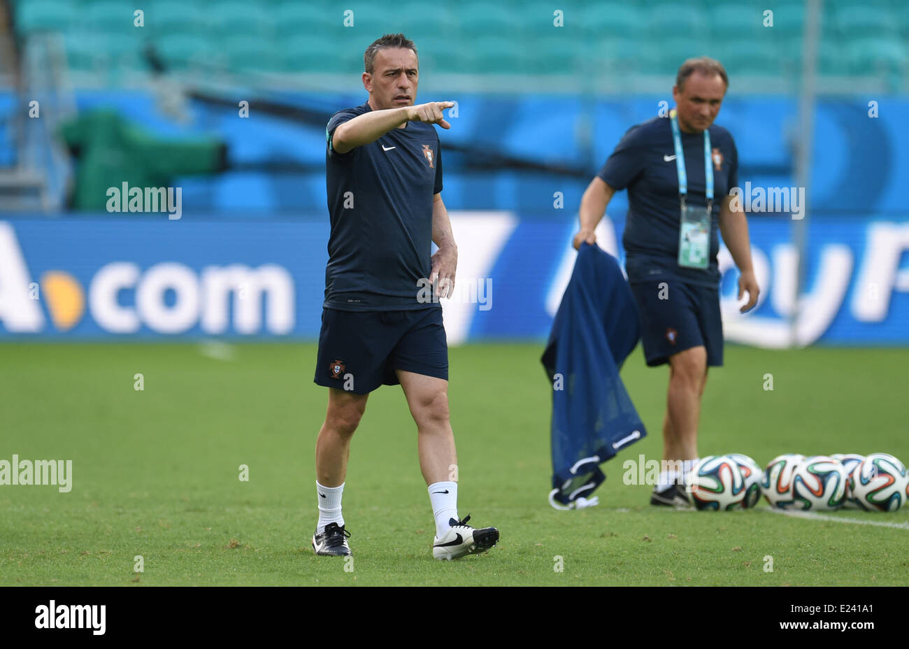 Salvador da Bahia, Brazil. 15th June, 2014. Head coach Paulo Bento (L) gestures during a training session of the Portugal's national soccer team at the Arena Fonte Nova Stadium in Salvador da Bahia, Brazil, 15 June 2014. Germany will face Portugal in their group G preliminary round match at the FIFA World Cup 2014 on 16 June 2014 in Salvador da Bahia. Photo: Andreas Gebertt/dpaile alert services, downloa/Alamy Live News Stock Photo