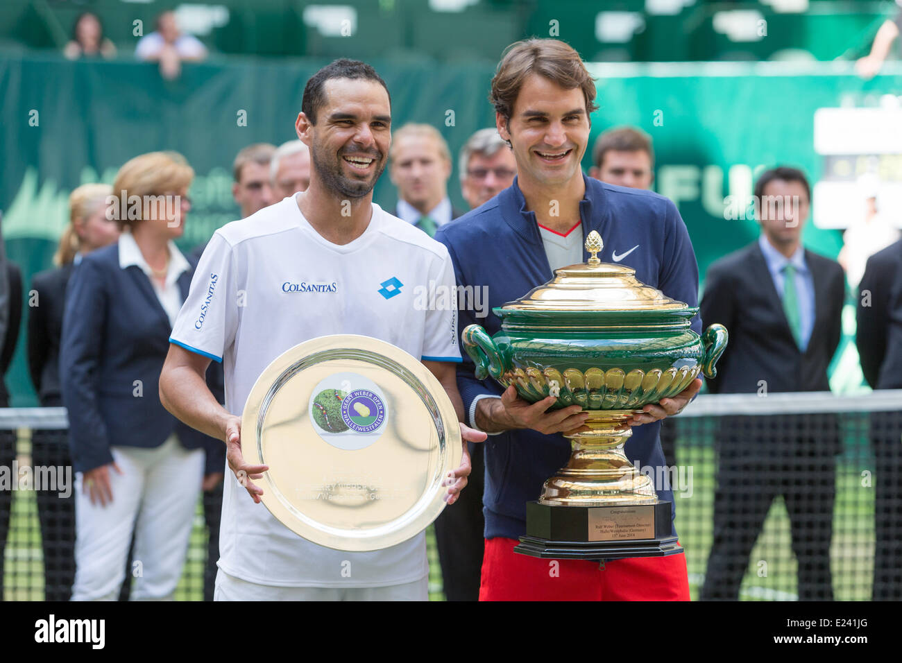 Halle, Germany. 15th June, 2014. Tennis players Roger Federer (SUI) and  Alejandro Falla (COL) show their trophies during the trophy ceremony after  the singles final of the Gerry-Weber-Open 2014 at the Gerry-Weber-Stadion,