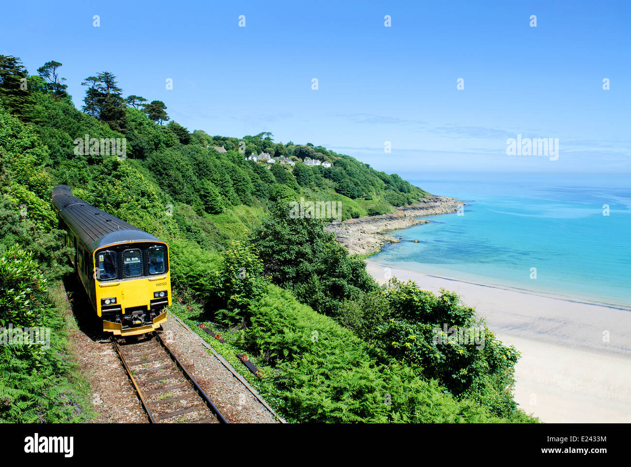 a train on the coast line at carbis bay in cornwall, uk Stock Photo Alamy