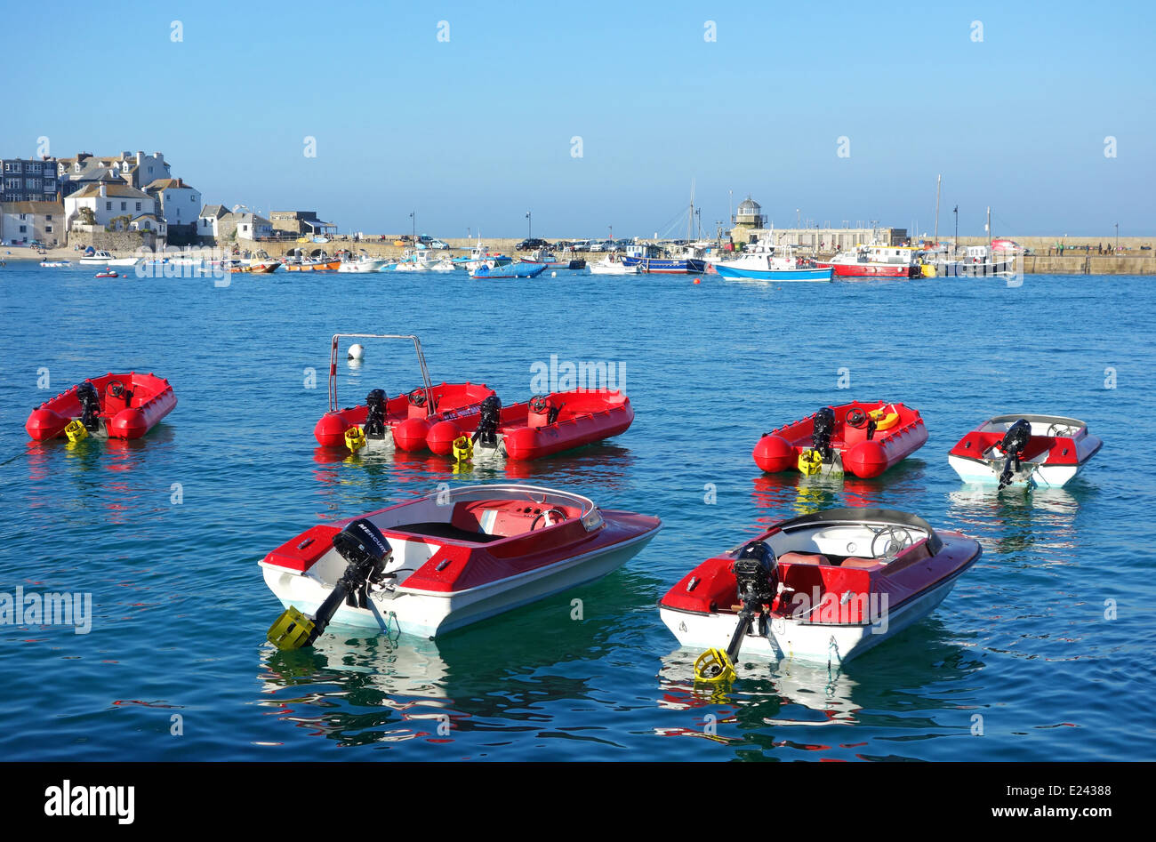 self drive motor boats in the harbour at st.ives, cornwall, uk Stock
