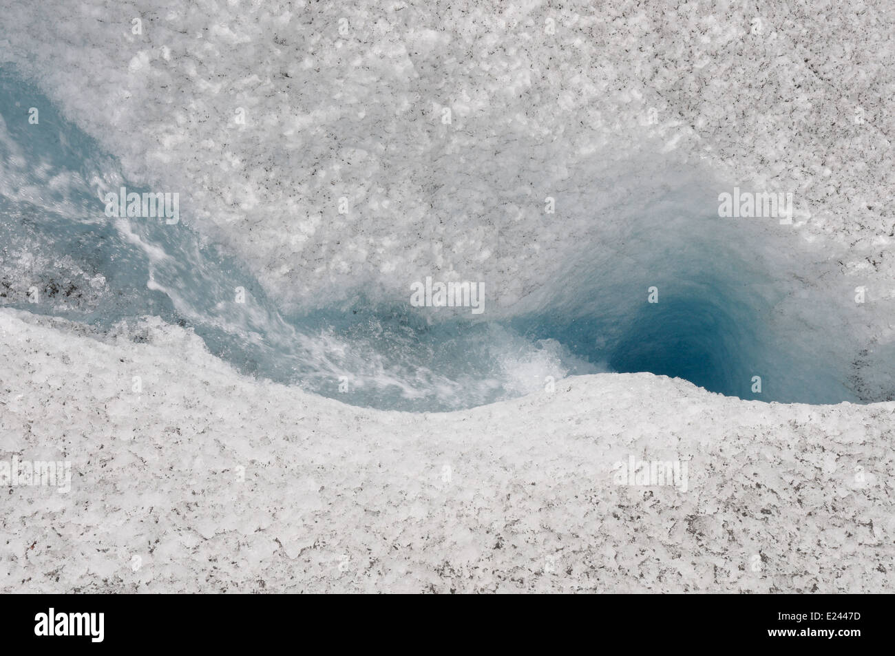 A moulin on the Ferpecle glacier in the swiss alps Stock Photo