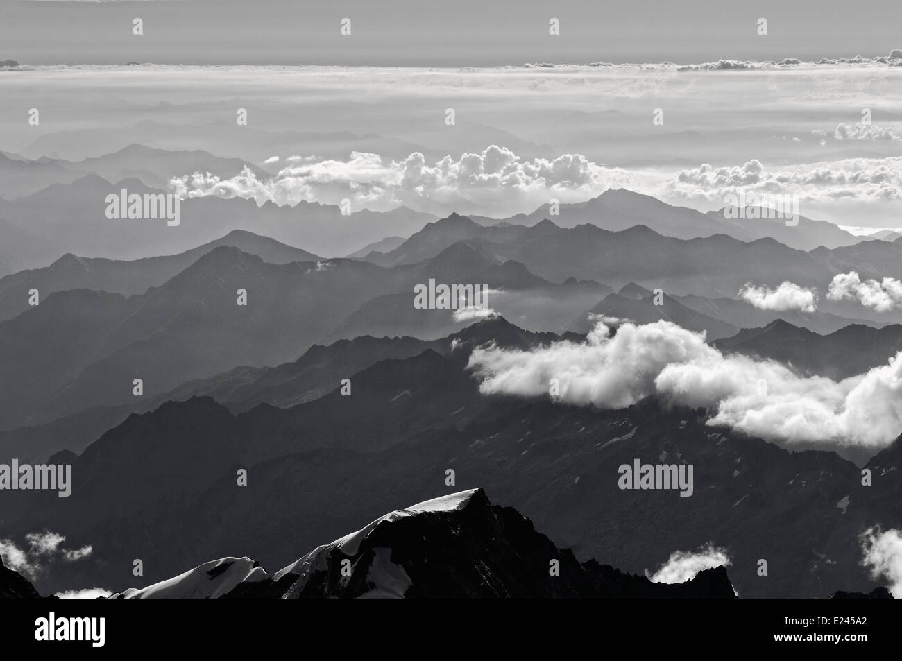 Haze in mountain valleys, Italian Alps Stock Photo