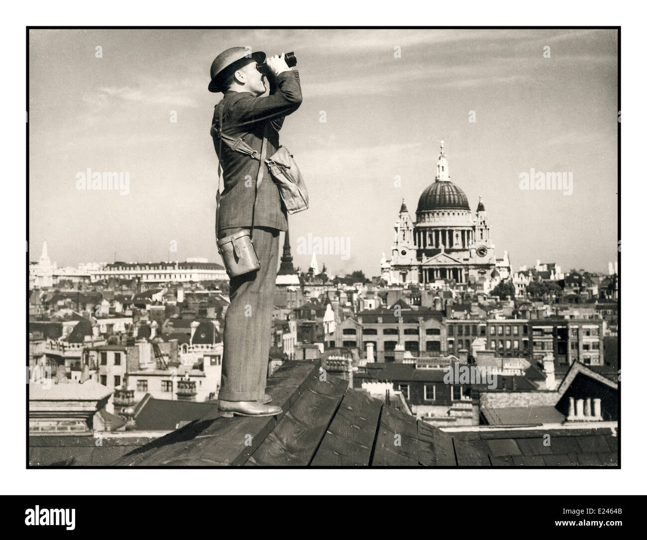 WW2 1940's Royal Observer Corps in City of London with dome of St. Paul’s Cathedral watching for German bombers in the Battle of Britain blitz Stock Photo