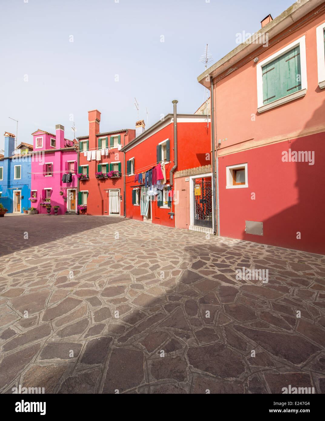 Murano and Burano island, street with glass store, beautiful colorfull houses, boats Stock Photo