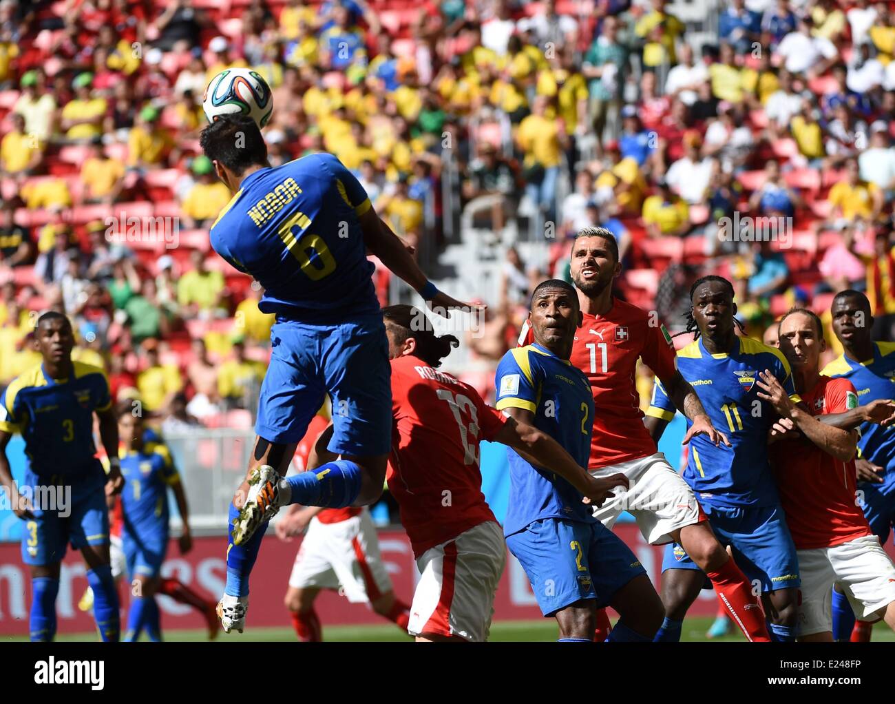 Brasilia, Brazil. 15th June, 2014. Swiss Cristian Noboa (front) leaps for the header during a Group E match between Switzerland and Ecuador of 2014 FIFA World Cup at the Estadio Nacional Stadium in Brasilia, capital of Brazil, June 15, 2014. Credit:  Action Plus Sports Images/Alamy Live News Stock Photo