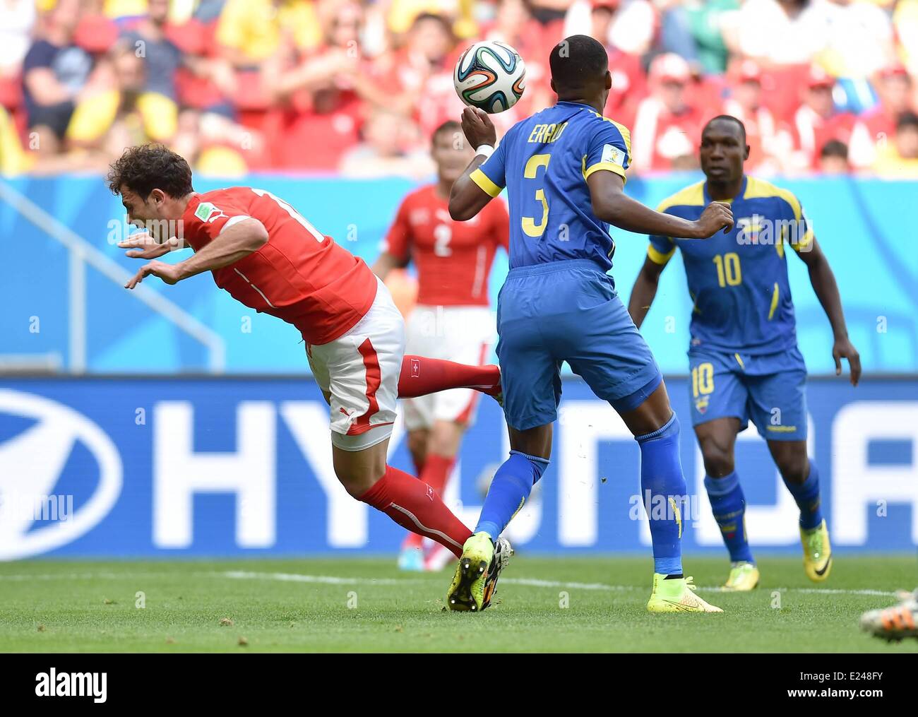 Brasilia, Brazil. 15th June, 2014. Admir Mehmedi (SUI) challenges Frickson Erazo (Ecuador) during a Group E match between Switzerland and Ecuador of 2014 FIFA World Cup at the Estadio Nacional Stadium in Brasilia, capital of Brazil, June 15, 2014. Switzerland won 2-1 over Ecuador on Sunday. Credit:  Action Plus Sports Images/Alamy Live News Stock Photo