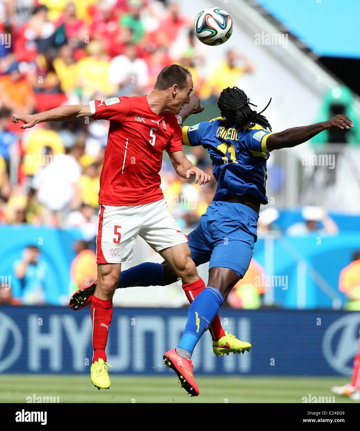 Brasilia, Brazil. 15th June, 2014. Swiss Steve von Bergen wins the header from Ecuadors Felipe Caicedo during a Group E match between Switzerland and Ecuador of 2014 FIFA World Cup at the Estadio Nacional Stadium in Brasilia, capital of Brazil, June 15, 2014. Credit:  Action Plus Sports Images/Alamy Live News Stock Photo