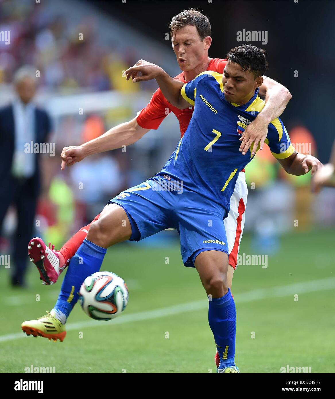 Brasilia, Brazil. 15th June, 2014. Stephan Lichtsteiner ( SUI) challenges Jefferson Montero (Ecuador) during a Group E match between Switzerland and Ecuador of 2014 FIFA World Cup at the Estadio Nacional Stadium in Brasilia, capital of Brazil, June 15, 2014. Credit:  Action Plus Sports Images/Alamy Live News Stock Photo