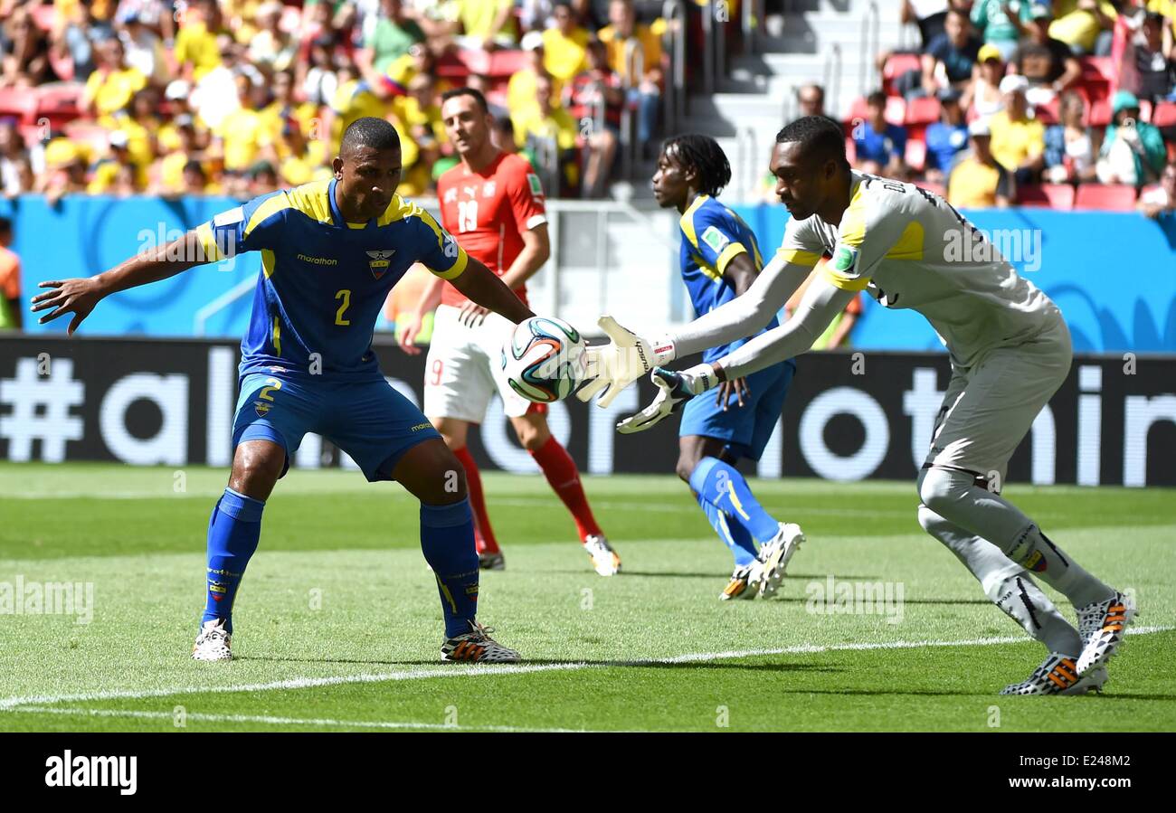 Brasilia, Brazil. 15th June, 2014. Ecuadors goalkeeper Alexander Dominguez (R) attempts to stop the ball during a Group E match between Switzerland and Ecuador of 2014 FIFA World Cup at the Estadio Nacional Stadium in Brasilia, capital of Brazil, June 15, 2014. Credit:  Action Plus Sports Images/Alamy Live News Stock Photo