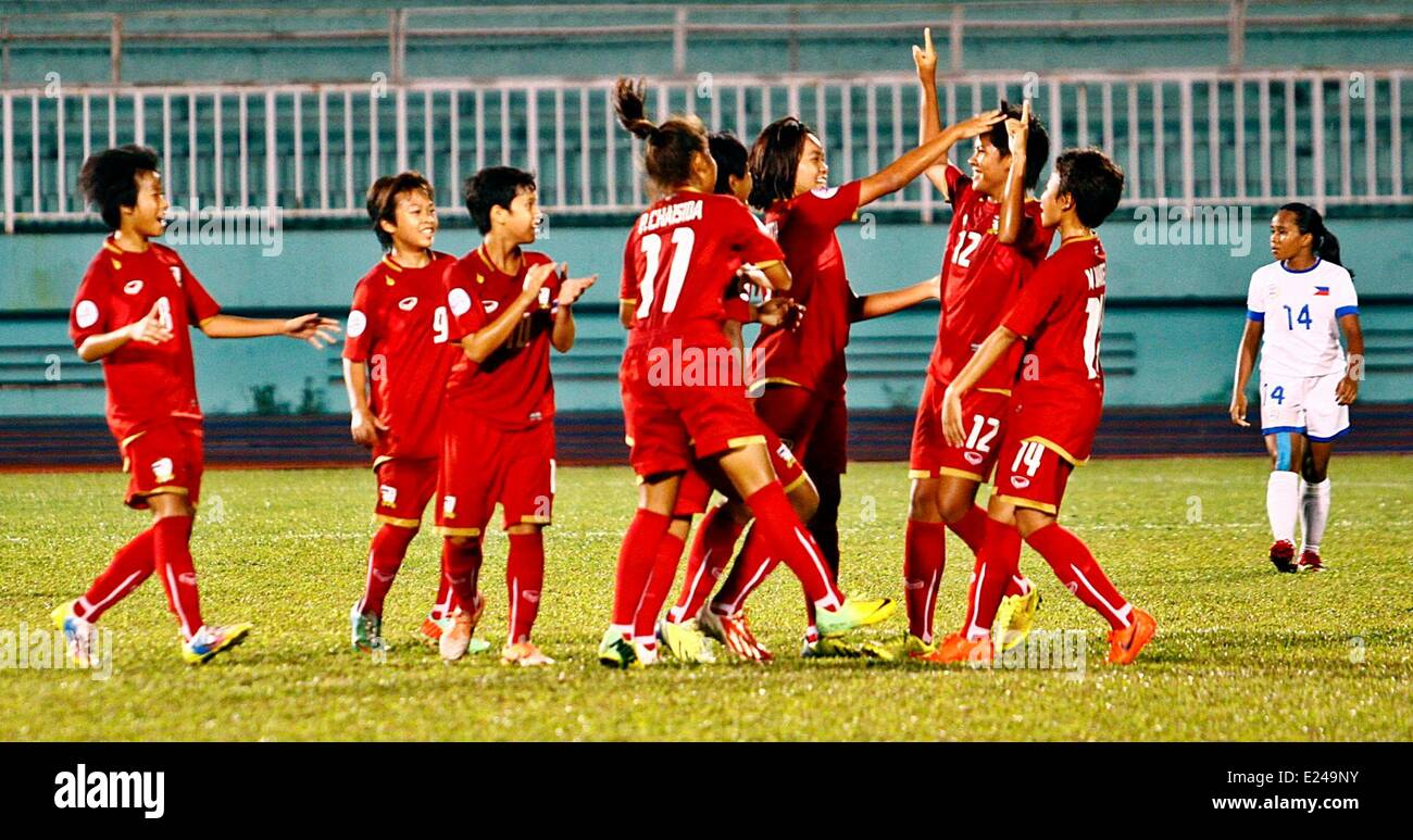 Ho Chi Minh City, Vietnam. 15th June, 2014. Players of Thailand celebrate after scoring a goal against the Philippines in the final match of the 2014 AFC U-14 Girls Regional Championship (ASEAN) at Thong Nhat Stadium in Ho Chi Minh City, Vietnam, on June 15, 2014. © Nguyen Le Huyen/Xinhua/Alamy Live News Stock Photo